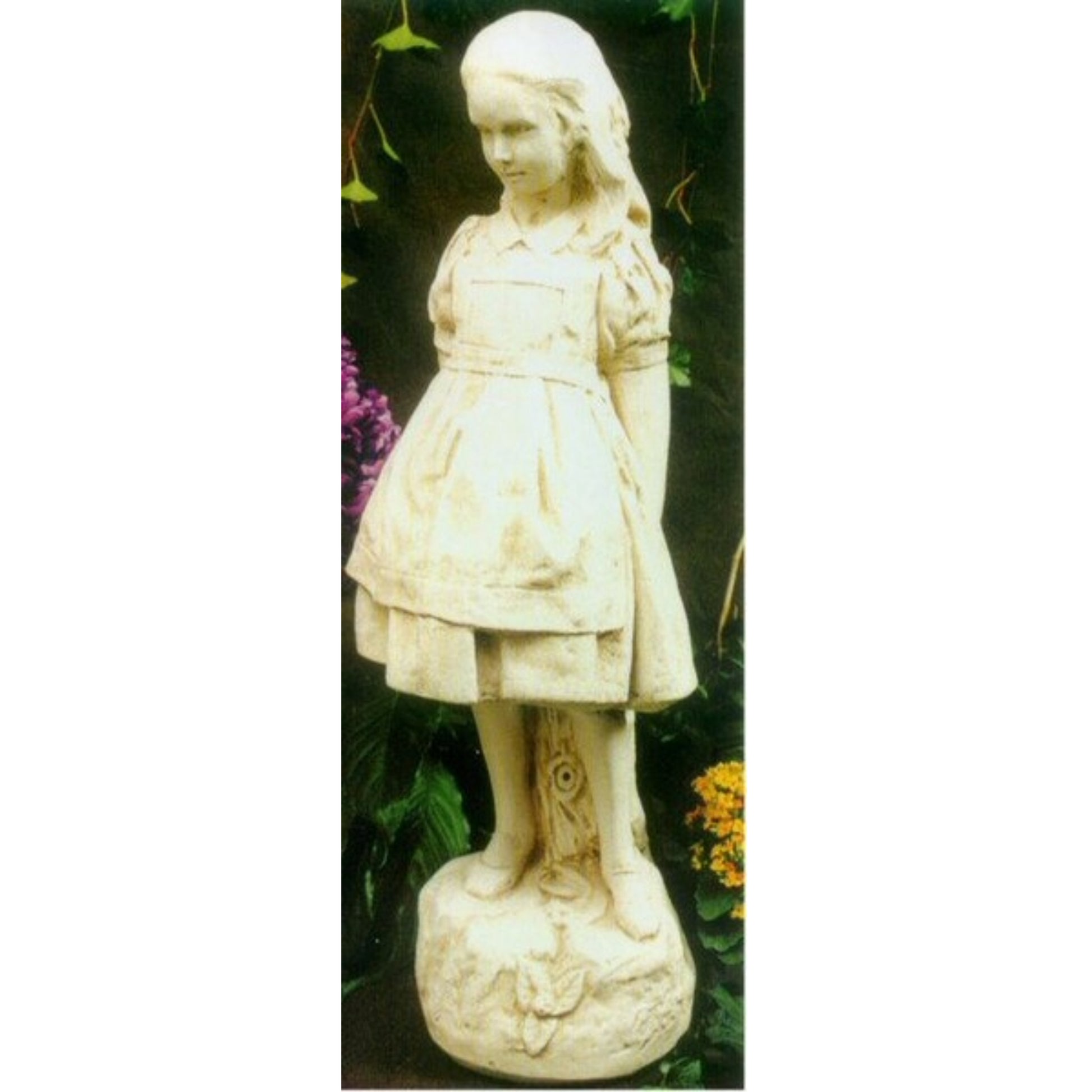 Alice In Wonderland Garden Sculpture Cement in a white stone color, standing in a garden.