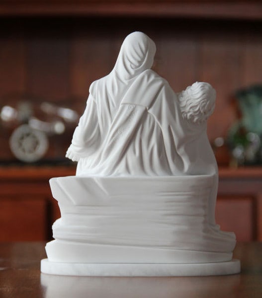 Pieta statue Michelangelo made of marble Italy Back view Sculpture