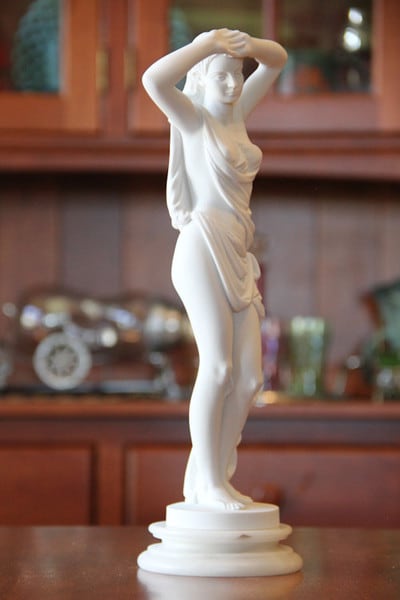 Phryne with Cloth Sculpture disrobed before the court sculptor Praxiteles