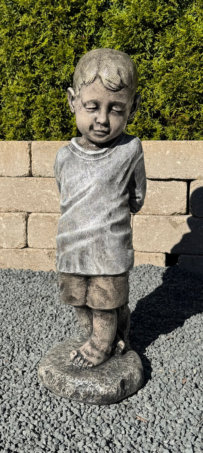 Bashful boy statue in special High-Tone finish by Henri Studio