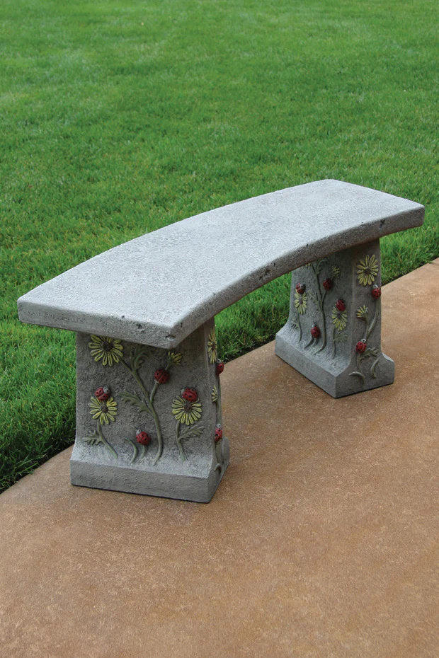 Add a touch of whimsy to your garden with the Ladybug Cement Bench