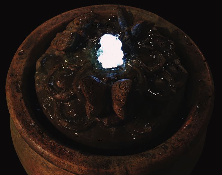 Butterfly Fountain with Nighttime Glow view in the evening