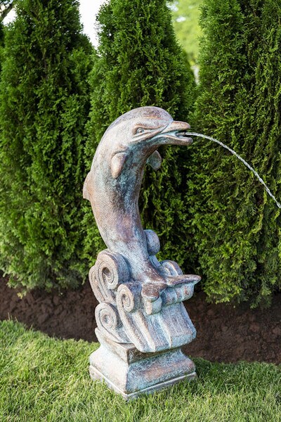 whimsical and enchanting Piped Spouting Dolphin atop the sturdy Base