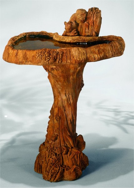 Squirrel Birdbath Garden Sculpture in Woodland Setting