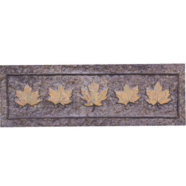 Close up of backrest of bench garden seating detailed Maple leaves leaf