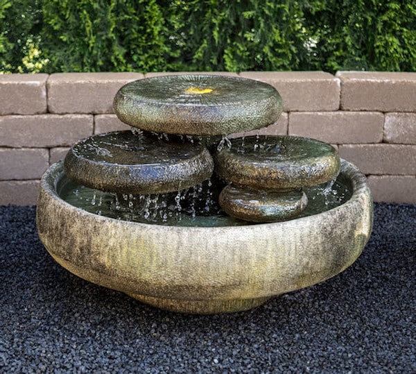 Water Lilies Fountain features shimmering pools of water unique cement