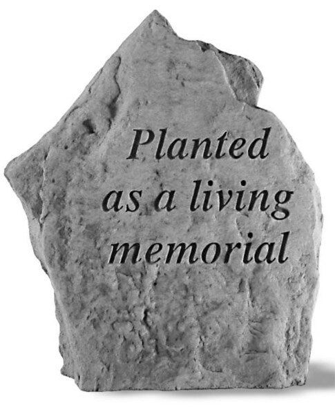 Stone garden memorial that reads Planted as a living memorial