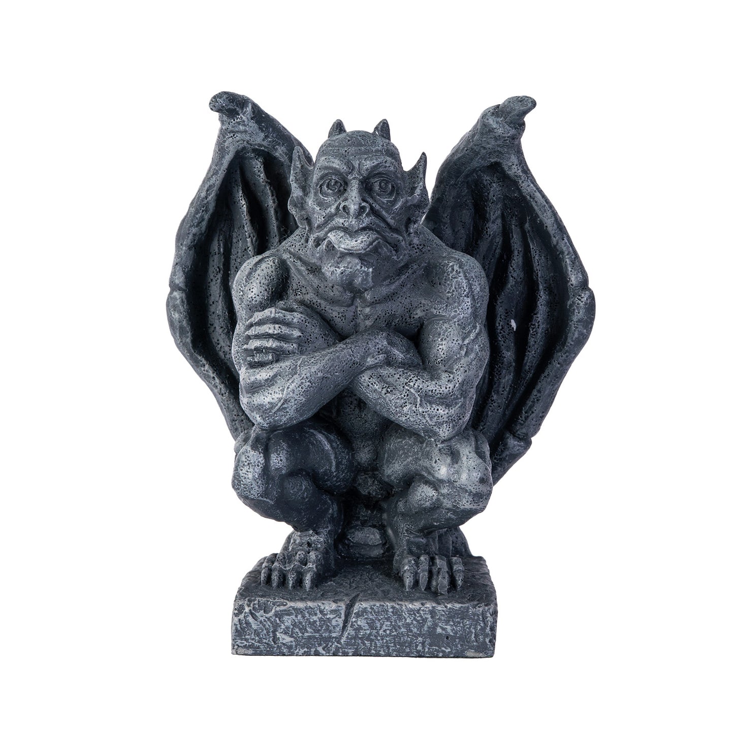 Gargoyle statue with wings spread on a white background arms folded