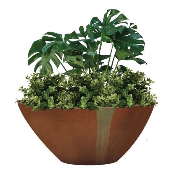 planter is shaped like an elongated oval rounded and curved profile