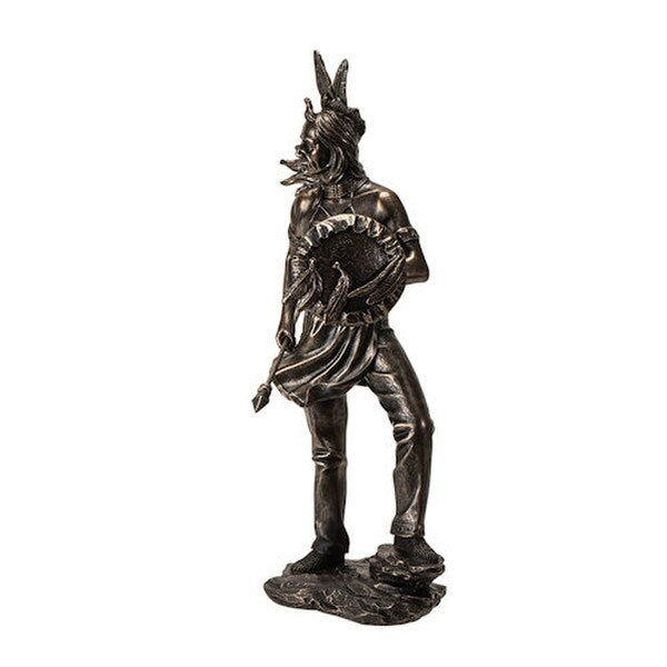 statue depicts a Native American warrior shield and spear proud Indian