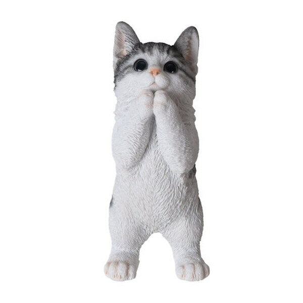Kitten Standing Cat Figurine is an adorable representation of youthful curiosity