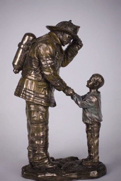 Child Thanking Fireman Statue