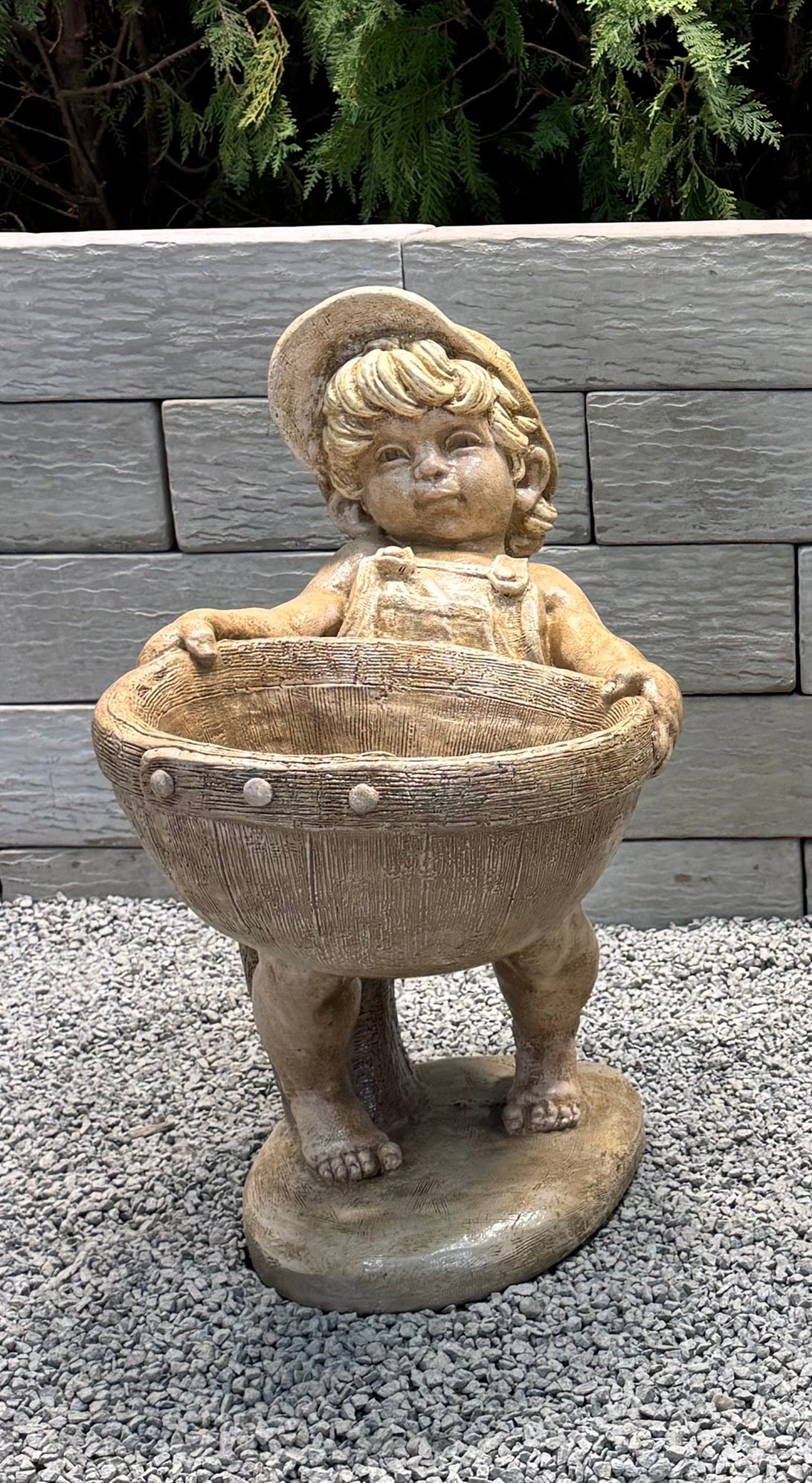 Flower Boy Planter Sculptural Urn with baseball hat carrying basket