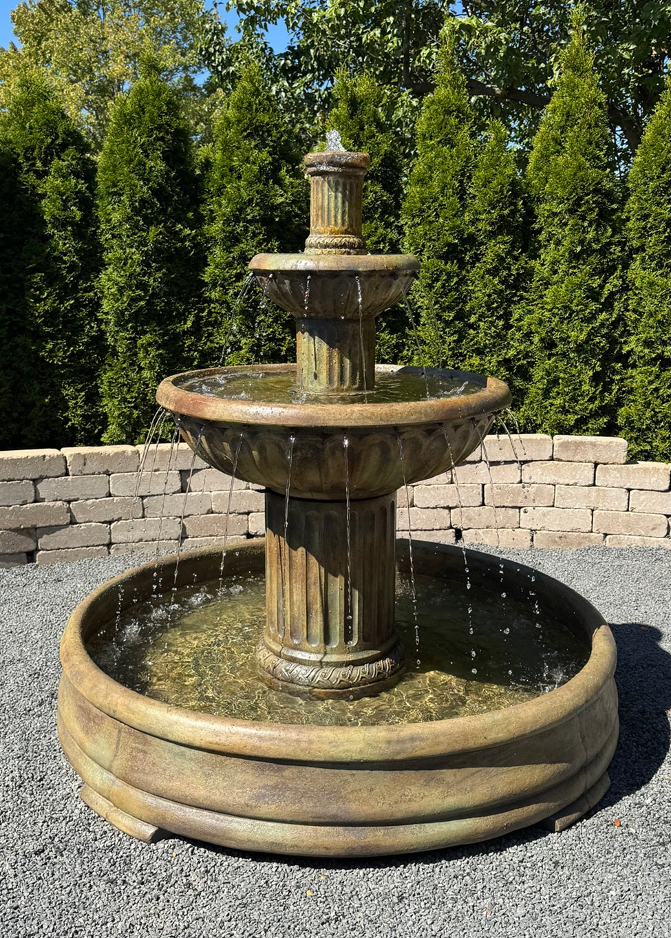Fluted Fountain in Grand Pool cast stone garden fountain