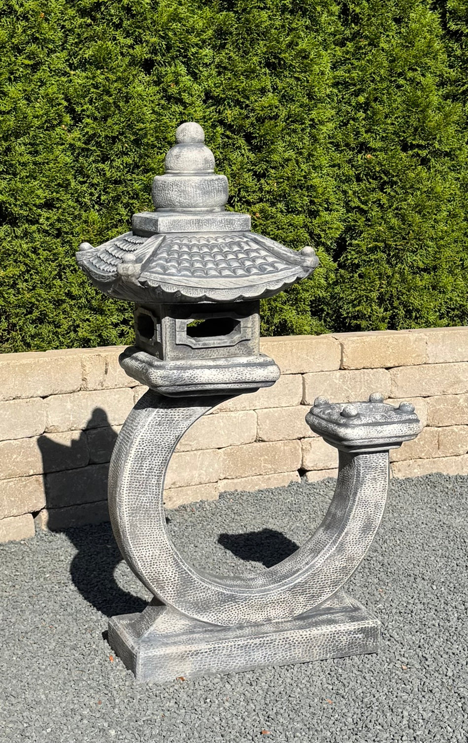 Cast Stone Curved pagoda lantern in cast stone with Asian-inspired design