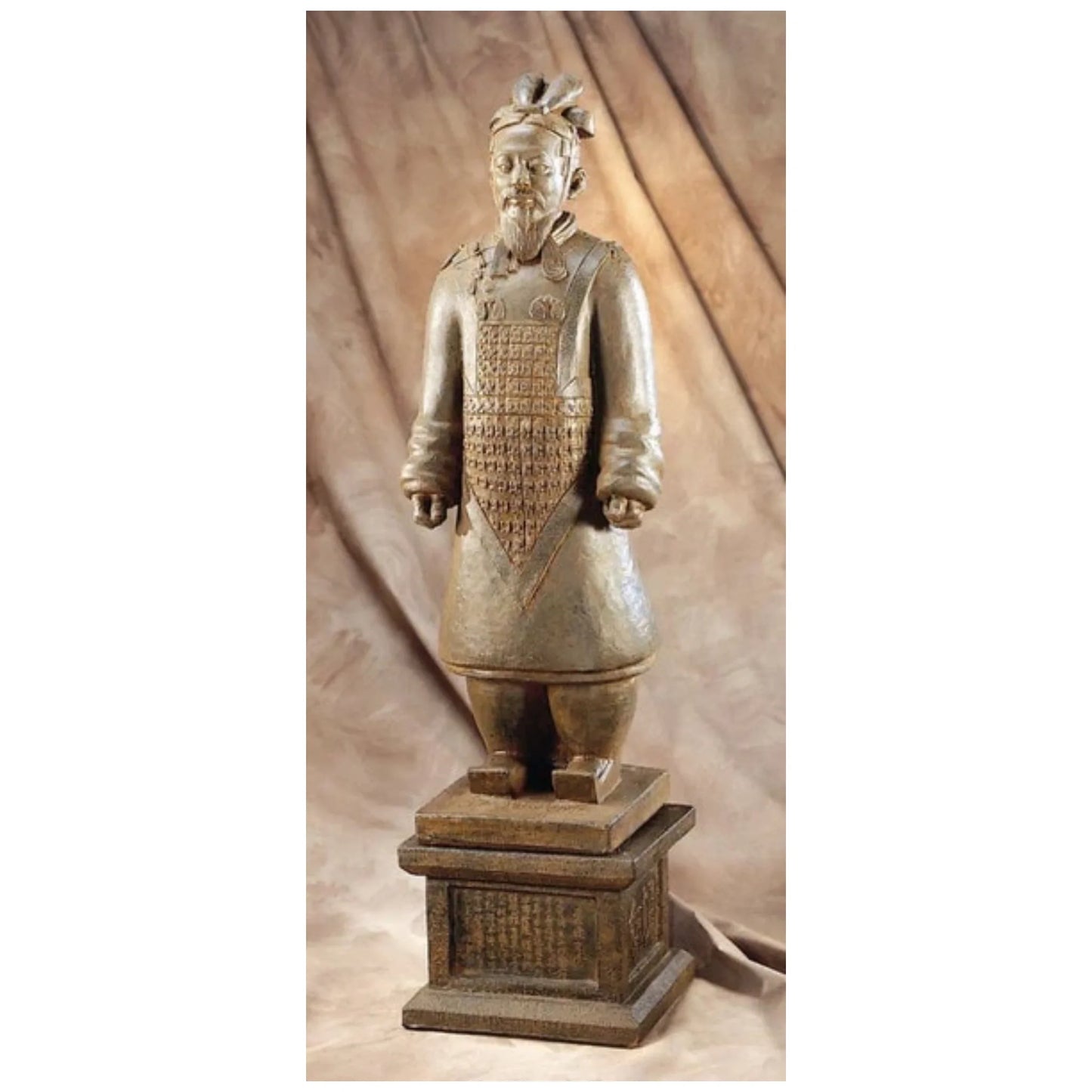 General Life-Size Statue Reproduction Terra-Cotta Warriors - Earth toned cloth backdrop - Statue is terra cotta in color.
