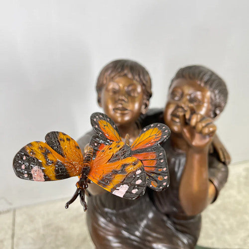 Two Children On Stump with Monarch Butterflies Bronze Statue