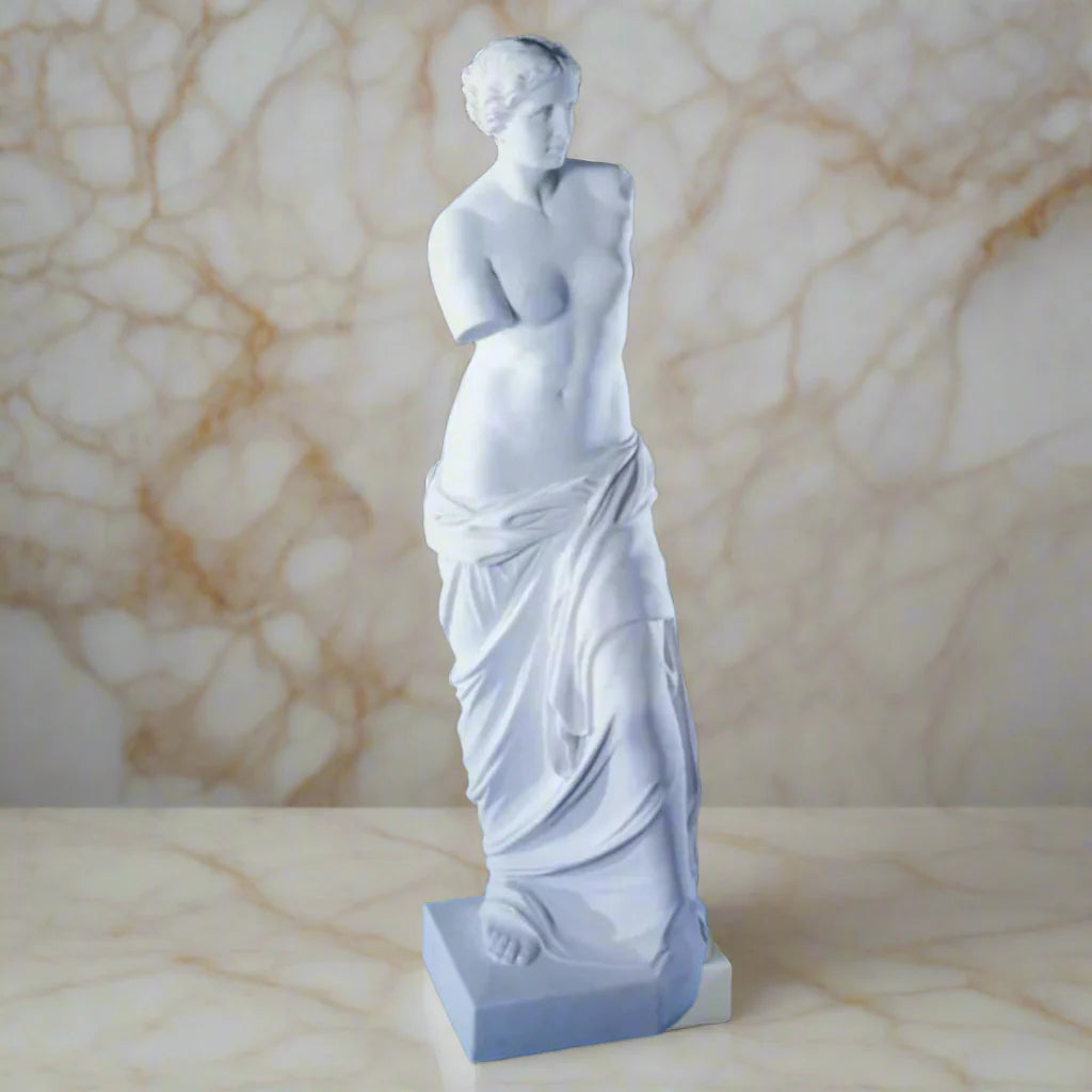 24-inch Venus De Milo marble statue on white marble background.