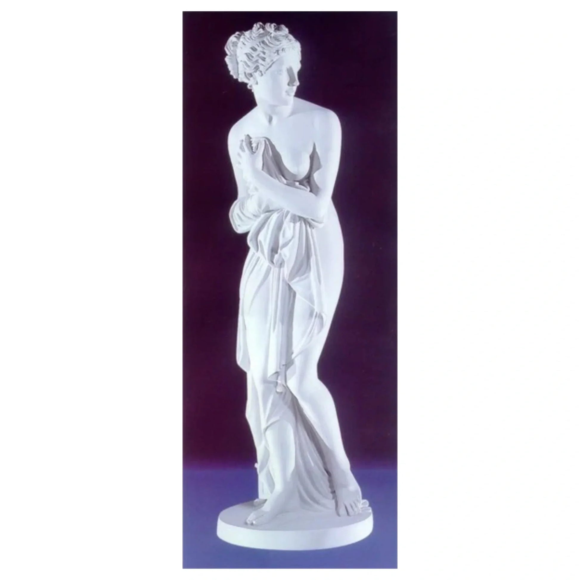Canova-inspired Venus Italica marble statue on a clean light orange marble background