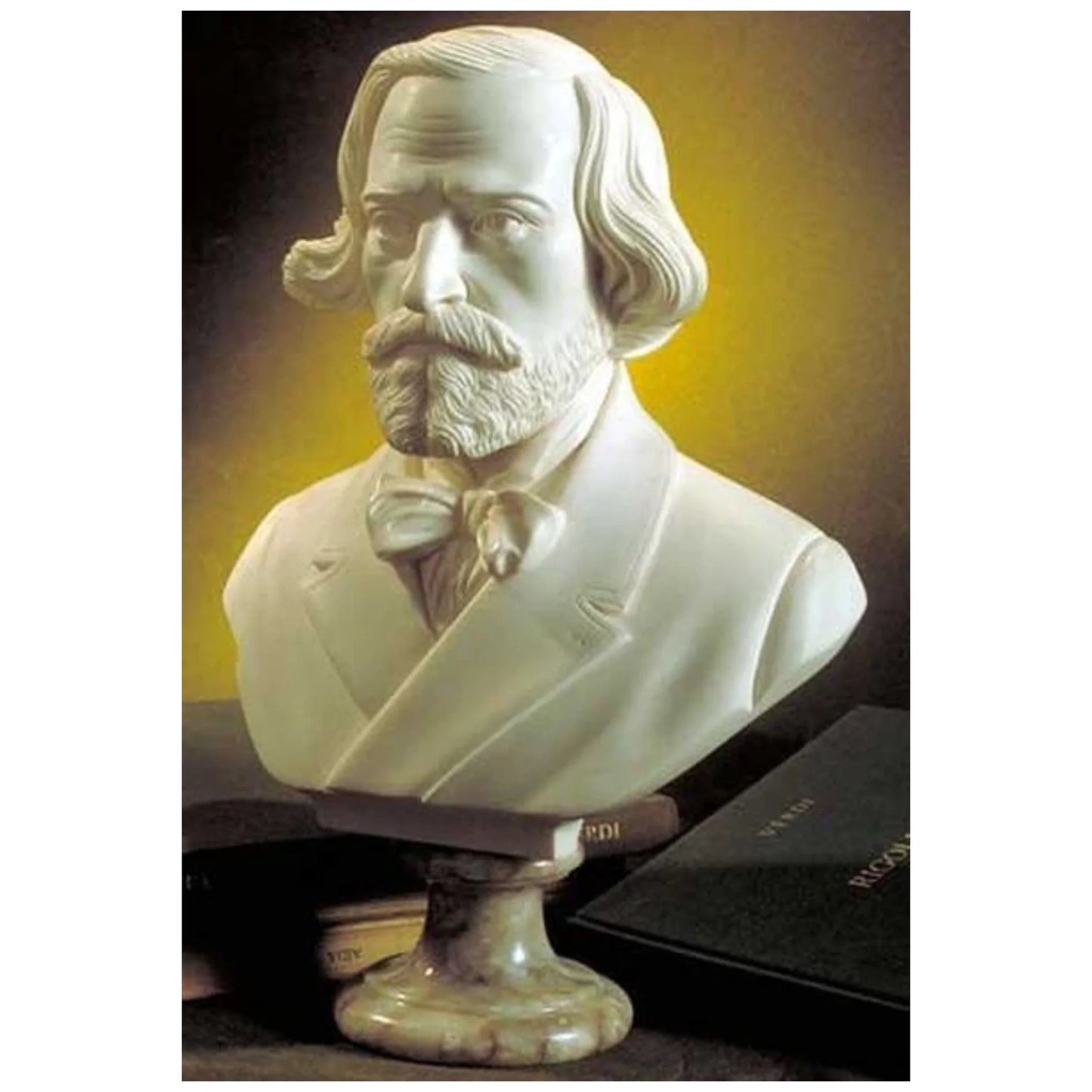 Bust of Verdi Giuseppe - A white marble statue, a few books are in the background, yellow & black backdrop.