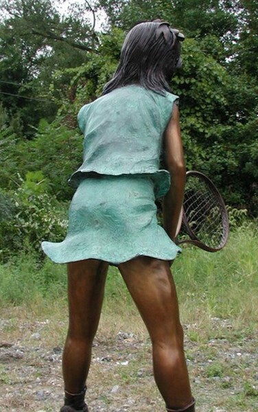 Girl Swinging a Tennis Racket Bronze Statue garden sculpture back view