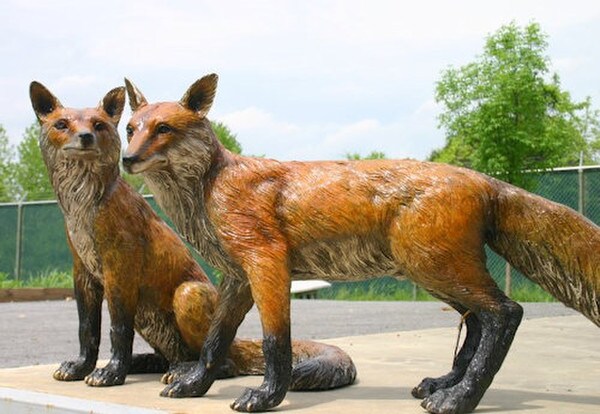 Fox sculptures image showcases two special patina statue pair wildlife
