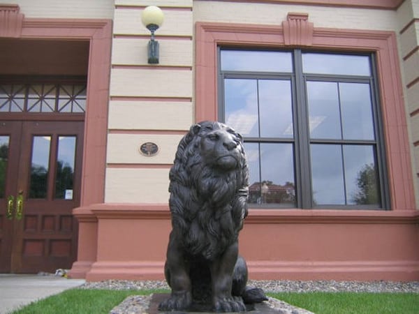 Noble Lions life size bronze statues left and right pair outdoor Library