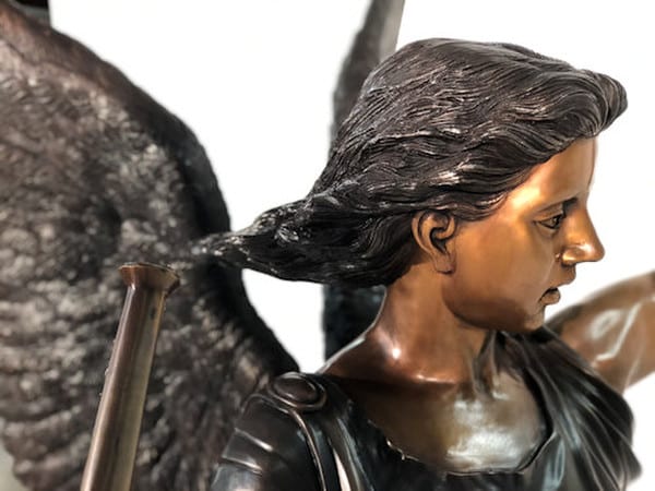 Close up of Gabrielle angel hair and face wings and trumpet