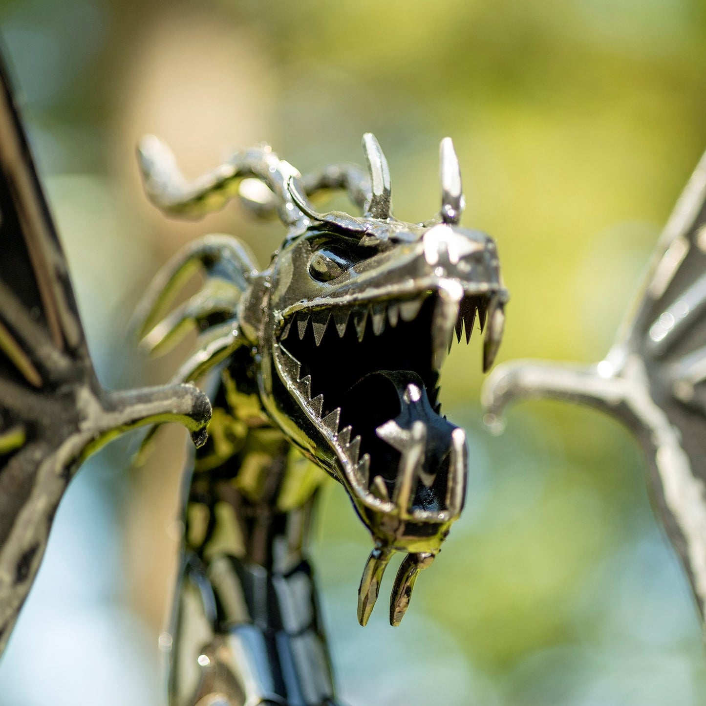 Iron Dragon Swing Stake with Tail Up "Sunfyre" - angle 6 face close up