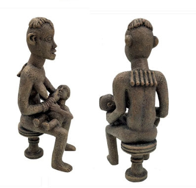 African ethnographic sculpture nursing mother statue back view and side 