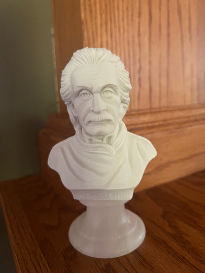 White Albert Einstein portrait sculpture on alabaster base