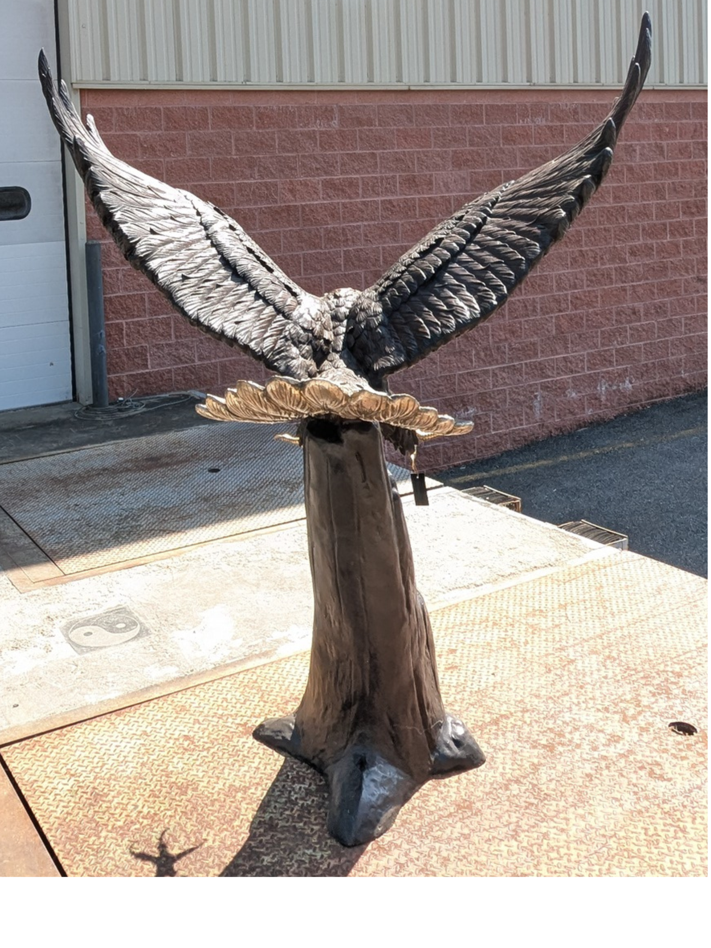 Back view American freedom eagle sculpture with outstretched wings
