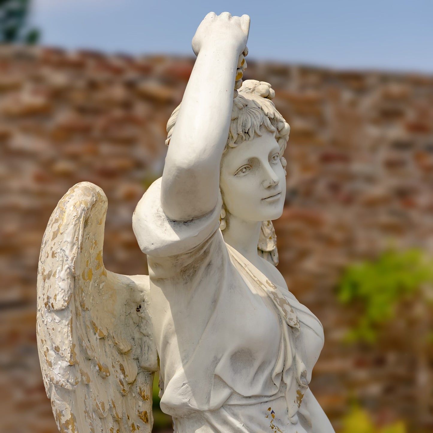 Close up Angel of the Harvest Life-Size Garden Sculpture with Grapes and Fruit Basket Estate Sized