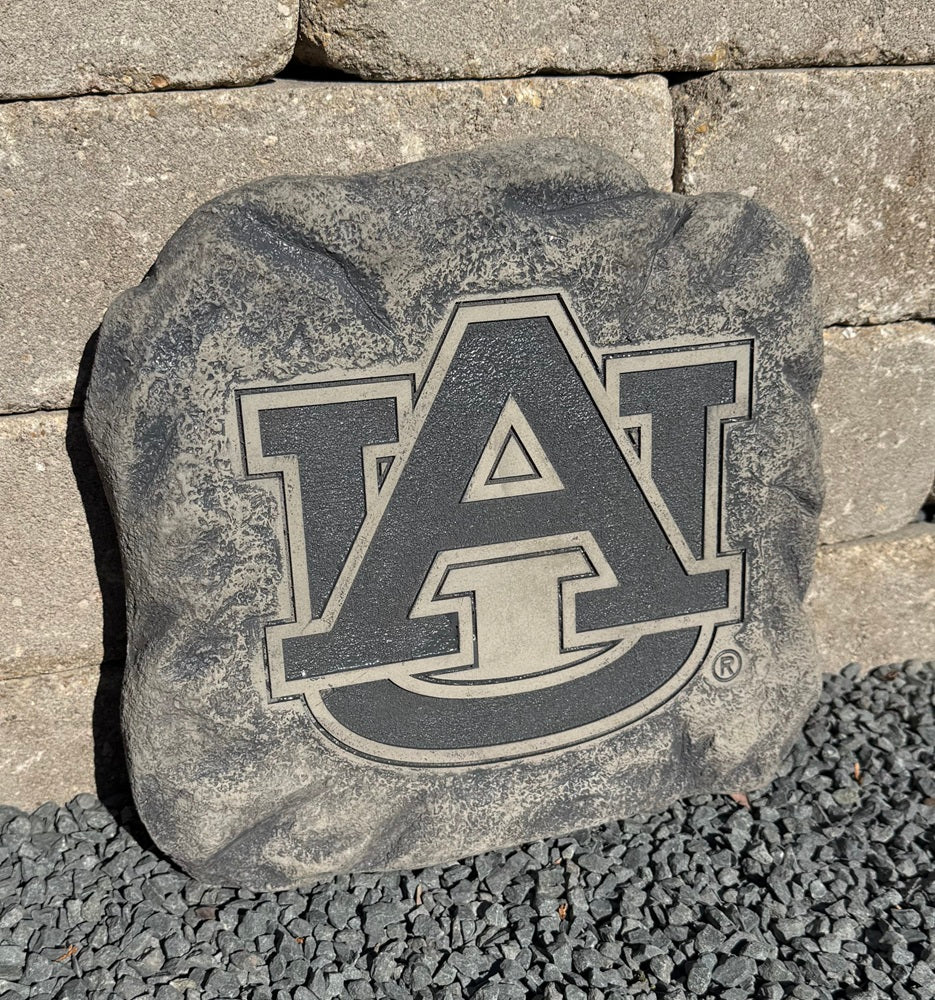 Auburn University logo stepping stone letter AU sculpted in statue