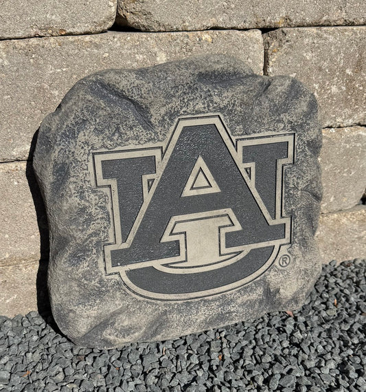 Auburn University logo stepping stone letter AU sculpted in statue