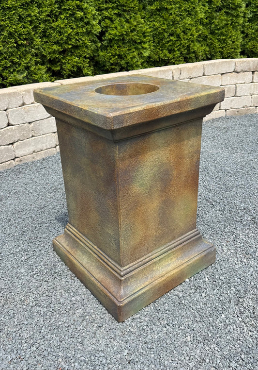 Avanti cast stone pedestal 26 inch has center drain in the center of the shaft column