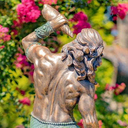 Bronze-finished statue of a muscular male figure with long hair, shown from the back and raised arm,  Neptune mermaid sculptures