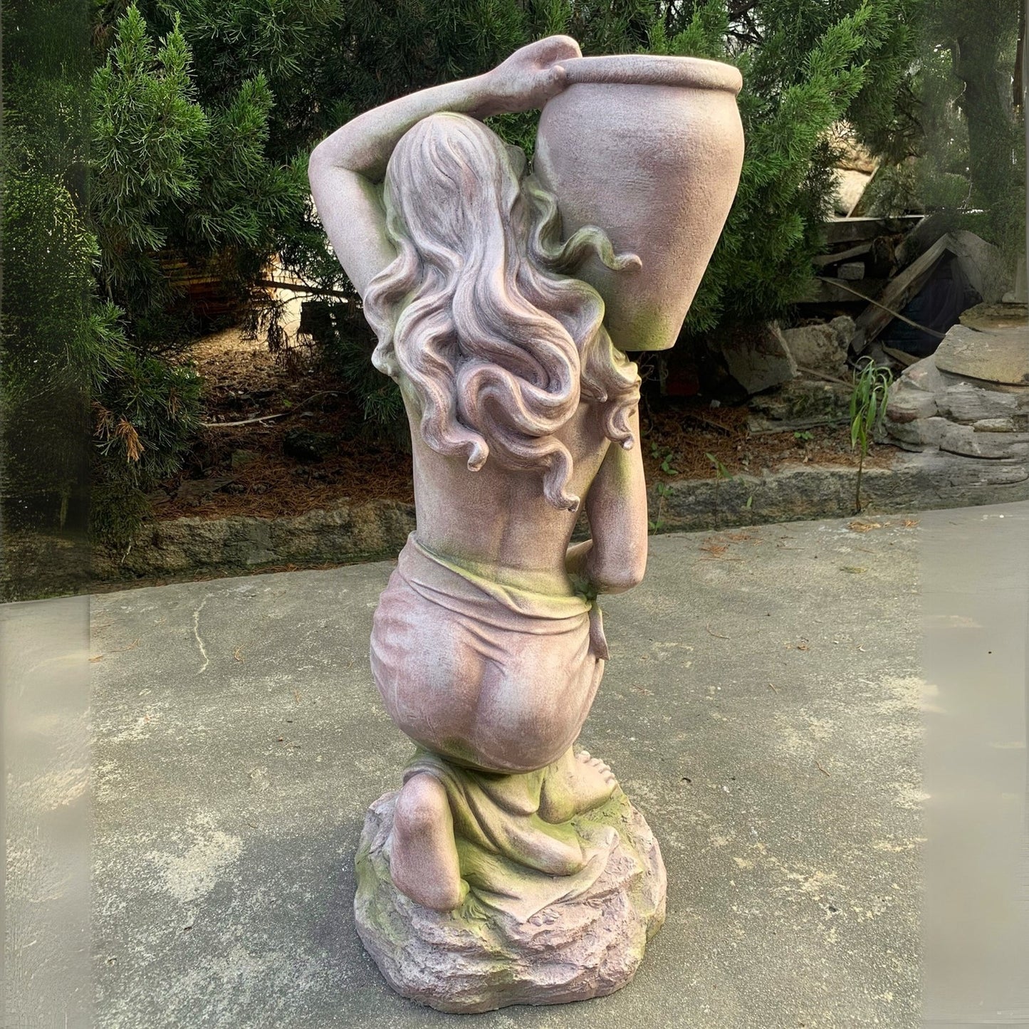 Back view of woman Biblical Rebecca Garden Sculpture with Urn