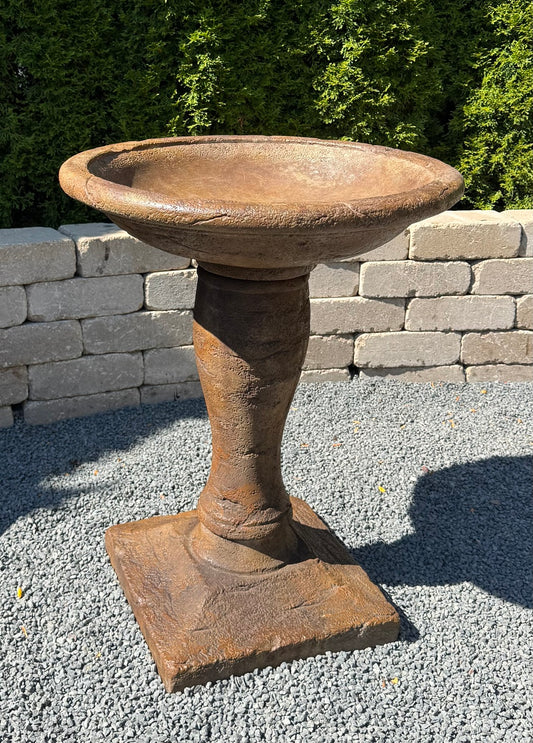 Europa Plinth Cast Stone Birdbath matches several wall fountains