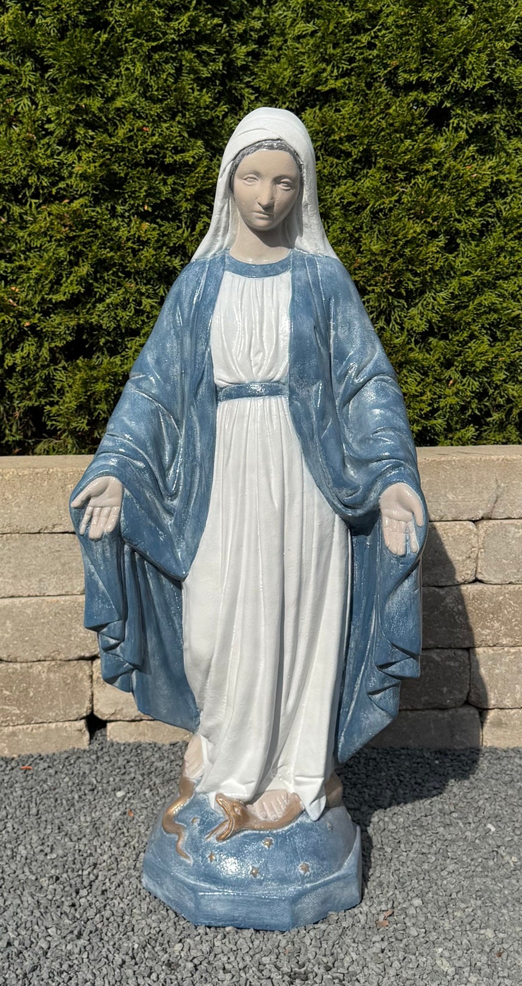 Create a serene sanctuary of prayer and reflection with this Blessed Mother Mary Cement Statue colored