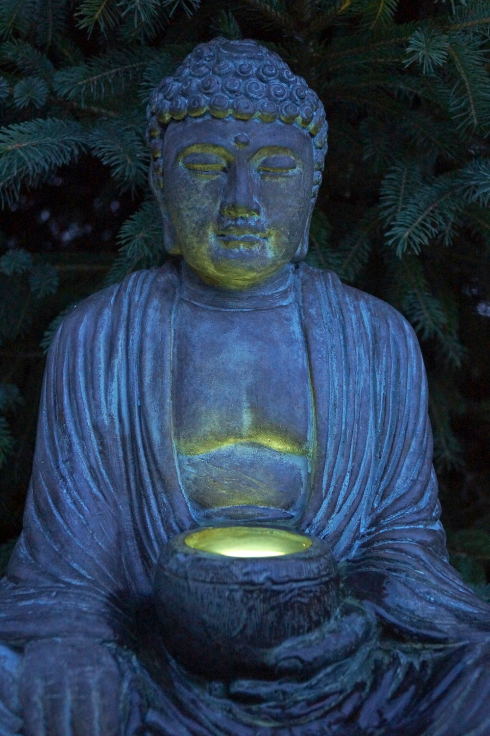 Buddha Garden Fountain with Light nigh time view of  sculpture water feature