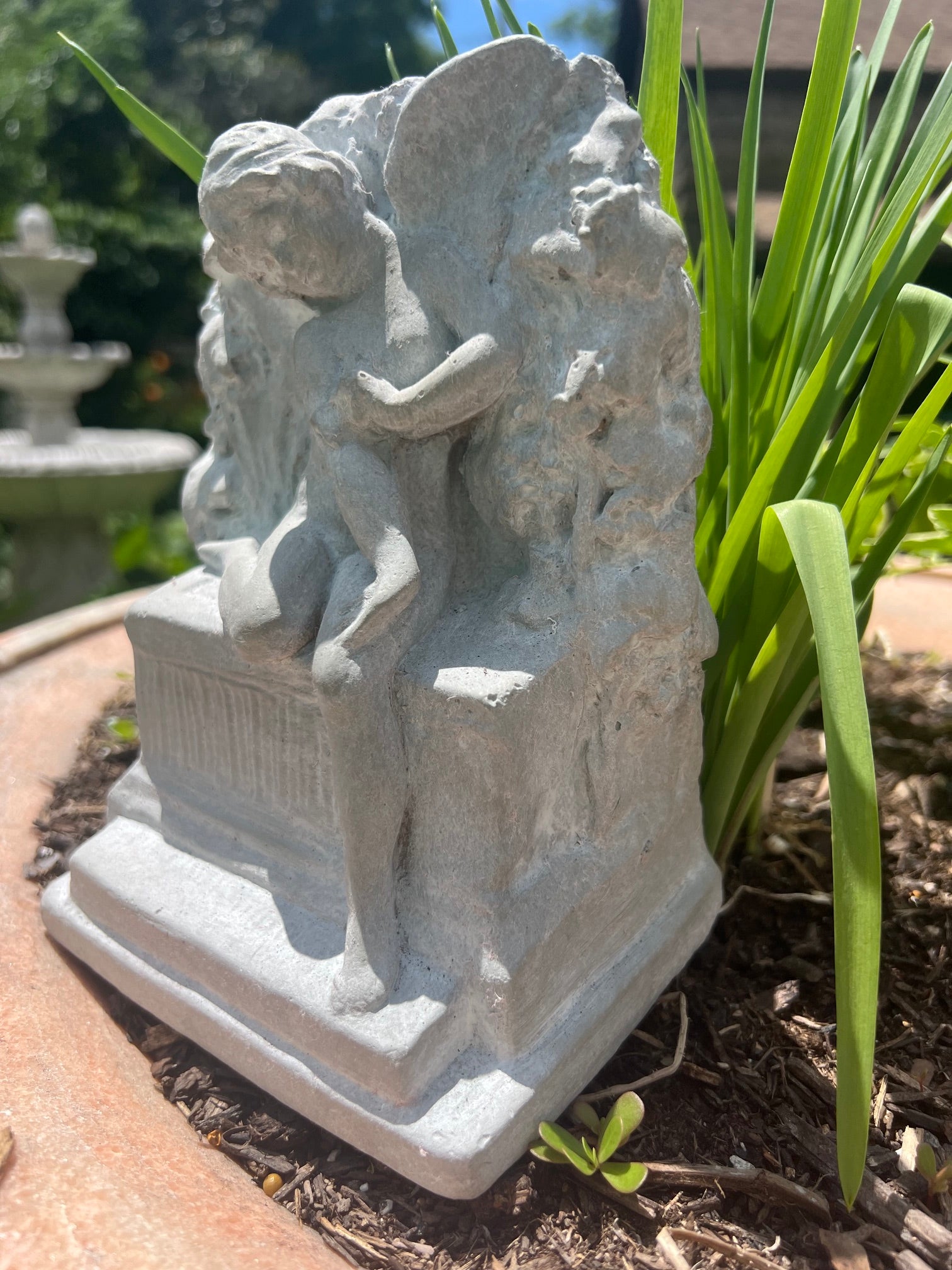 Small cast stone fairy statue for gravesite memorial