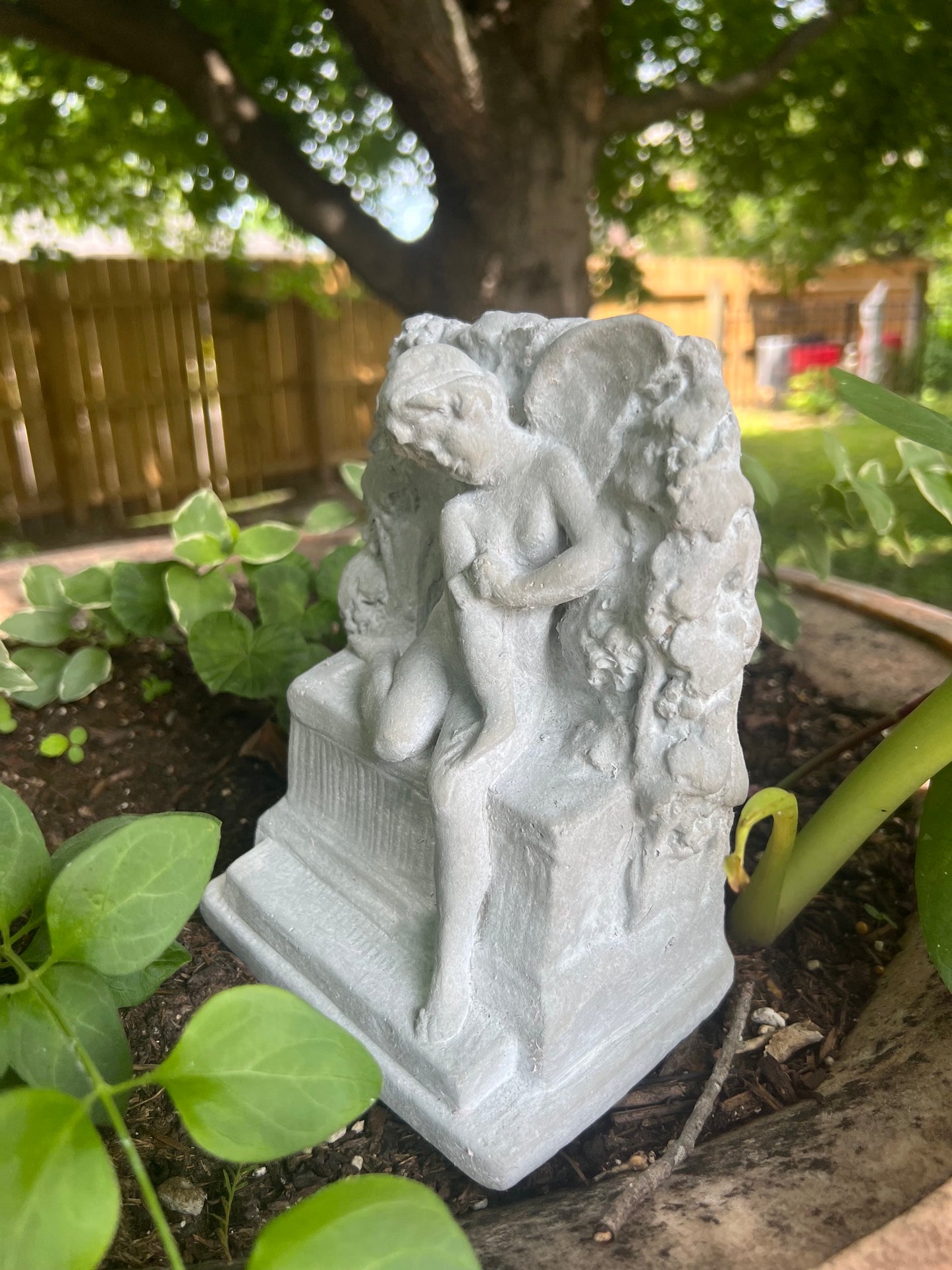 Peaceful butterfly cherub statue for remembrance garden