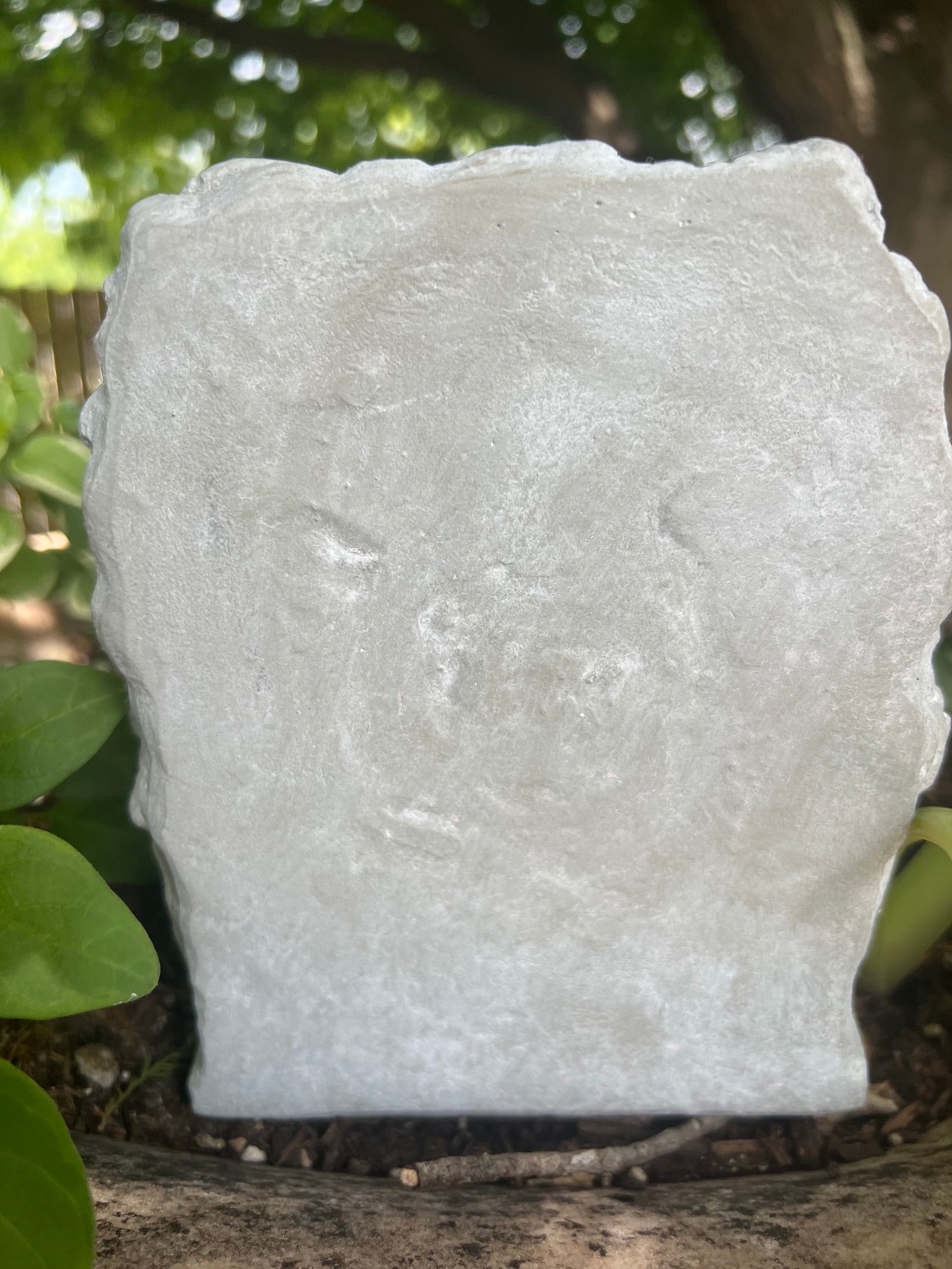 Back view Peaceful butterfly cherub statue for remembrance garden