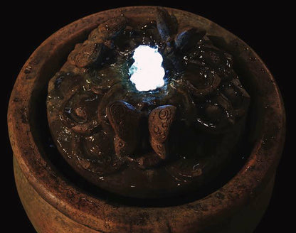 Butterfly Fountain with Nighttime Glow view in the evening