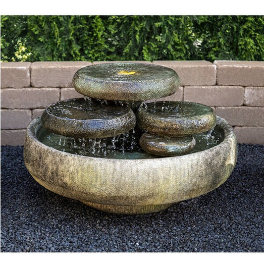 Water Lilies Fountain features shimmering pools of water Retro Modern