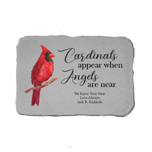 Cardinals appear when Angels are written onto this stone memorial statue