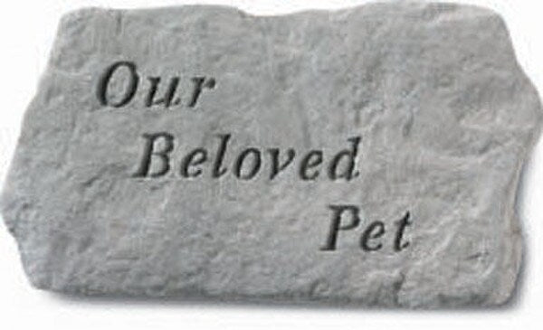 Cement pet memorial - Our beloved Pet is written across the center