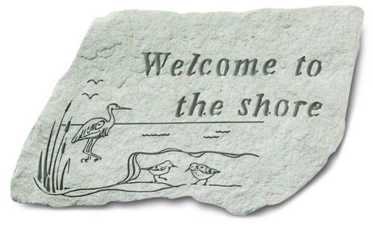 Concrete stepping stone with message - Welcome to the shore