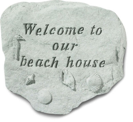 Concrete stepping stone with message - Welcome to our beach house